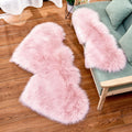 tapis fourrure rose poudré