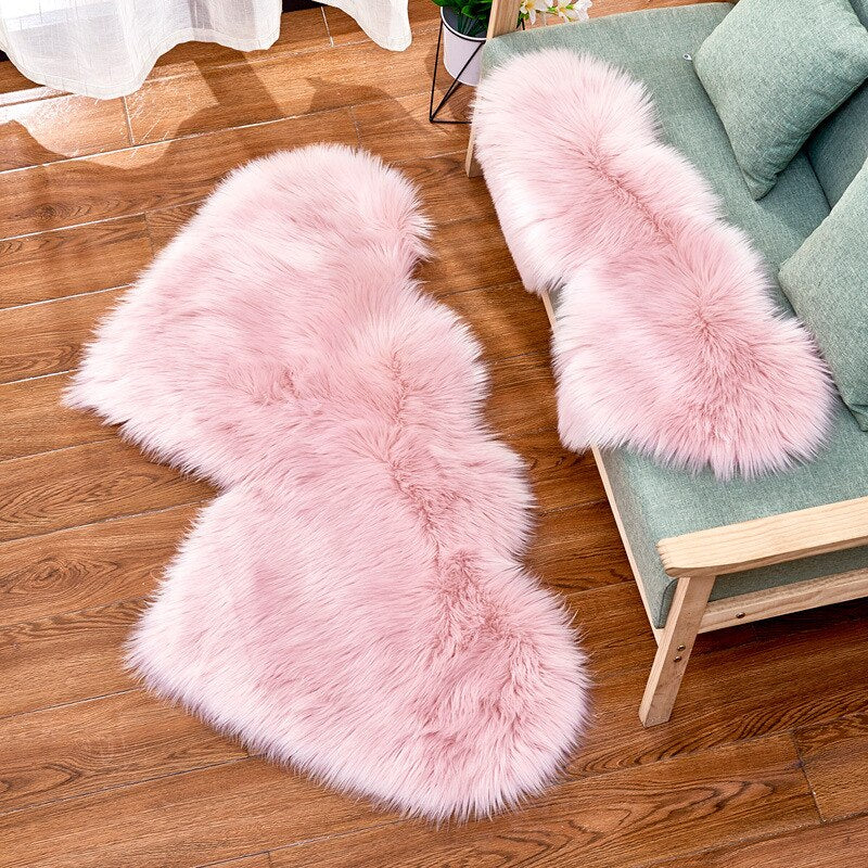 tapis fourrure rose poudré