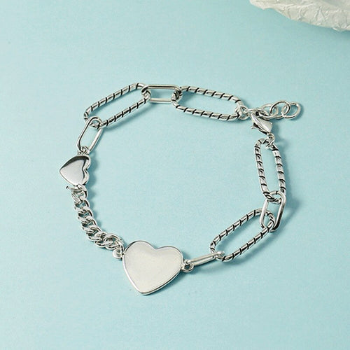 bracelet avec un gros coeur