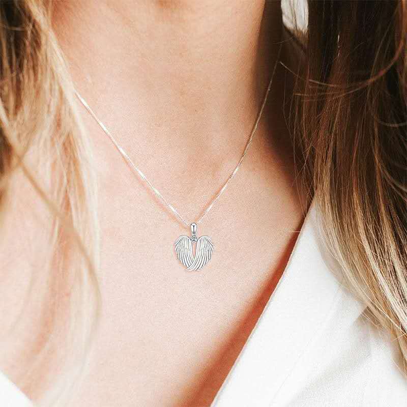 Pendentif coeur avec des ailes
