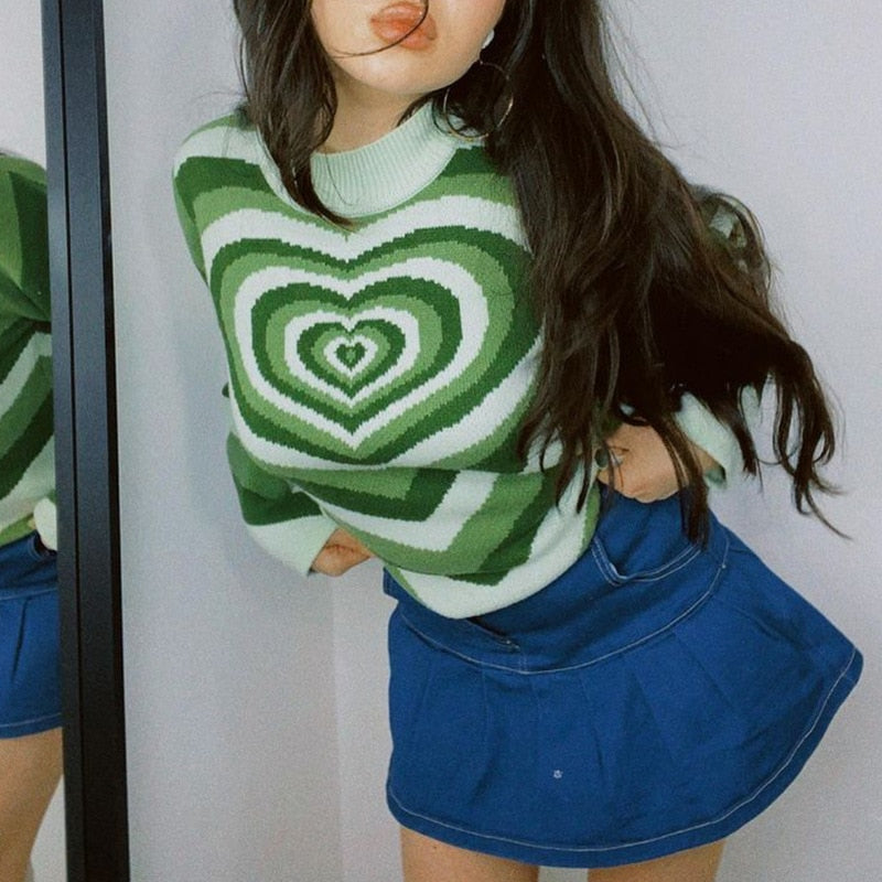 pull avec coeur vert